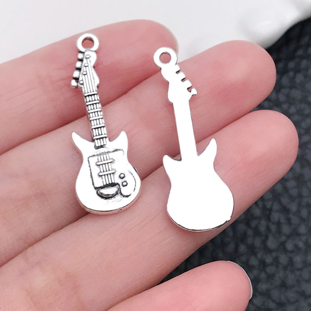 Wholesale Antique Silver Violin Guitar Saxophone Instrument Notes Creative DIY Necklace Bracelet Pendant